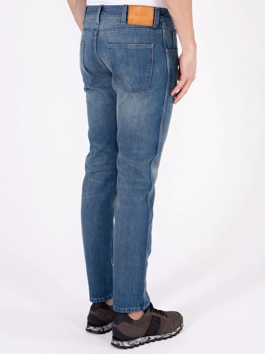 Джинсы с потертостями