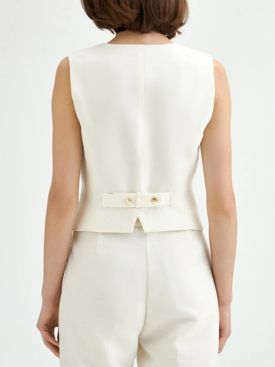 Жилет из района