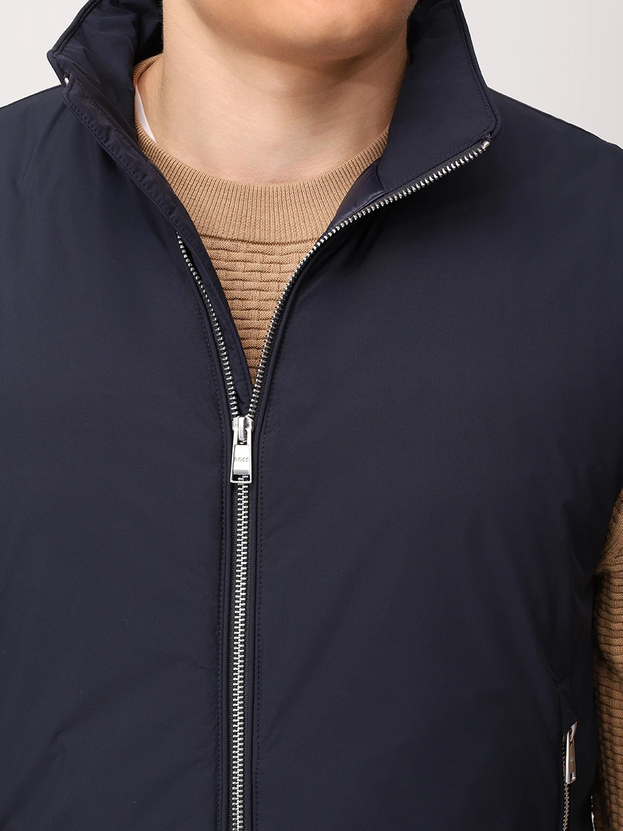 Жилет пуховый