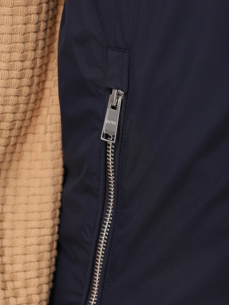 Жилет пуховый