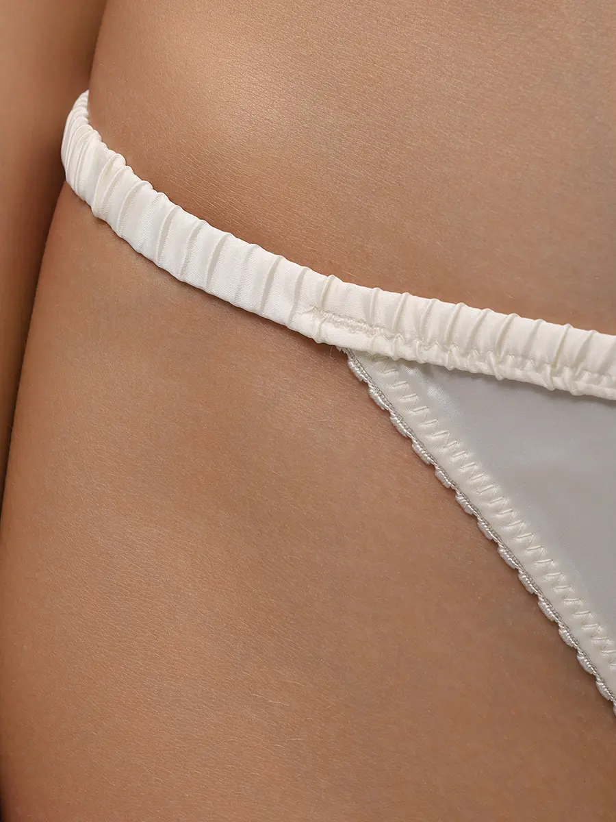 Трусы-танга с кружевом