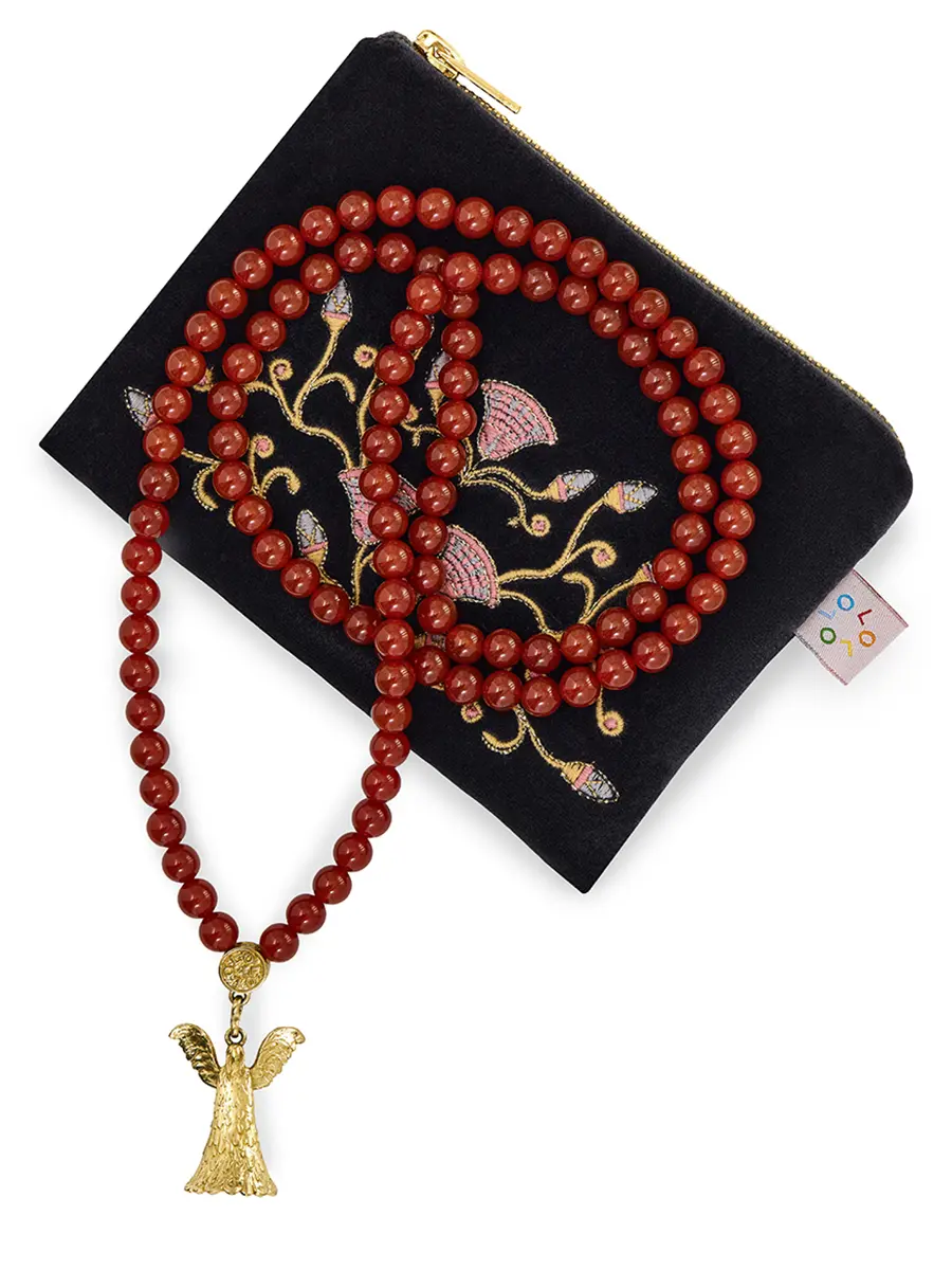 Четки с сердоликом в косметичке