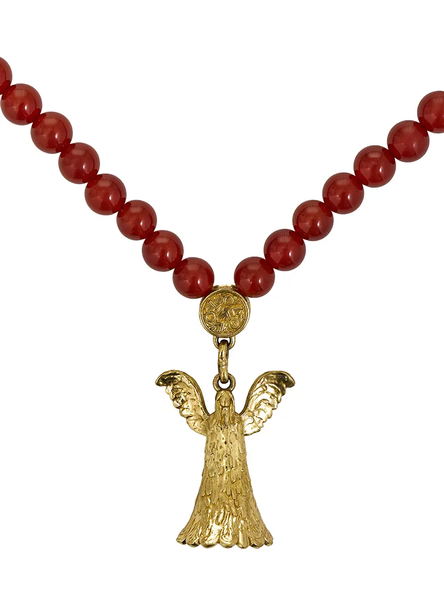 Четки с сердоликом в косметичке