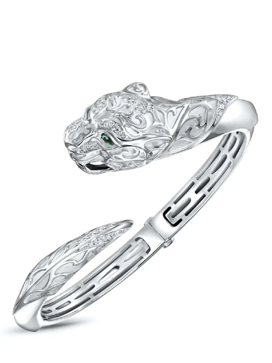 Браслет из белого золота с бриллиантами и изумрудом