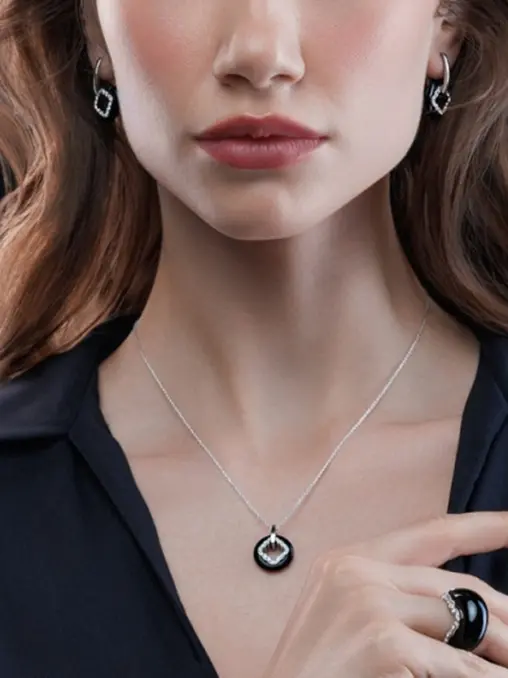 Серьги из белого золота с бриллиантами и ониксом CARRERA Y CARRERA