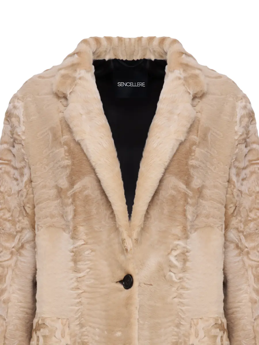 Пальто из каракуля